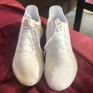 White Adidas running shoes